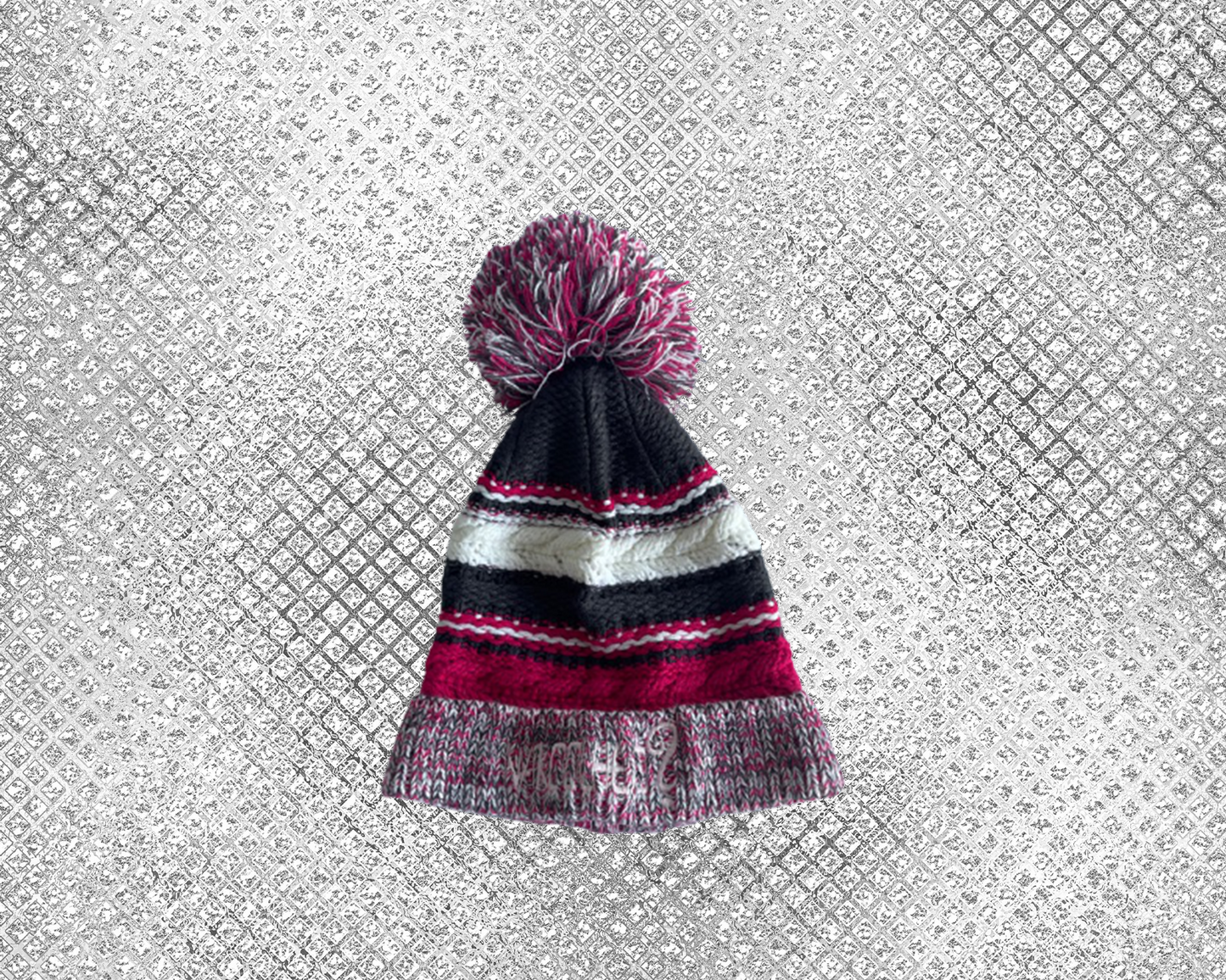 PINK BLACK AND WHITE SKULLY WITH POM POM